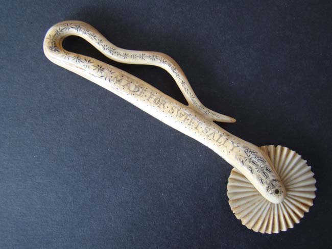 A fine and rare 19th century sailor made Whalebone Pie Crimper inscribed "Made for 'SWEET SALLY' by Thomas Allen 1859."